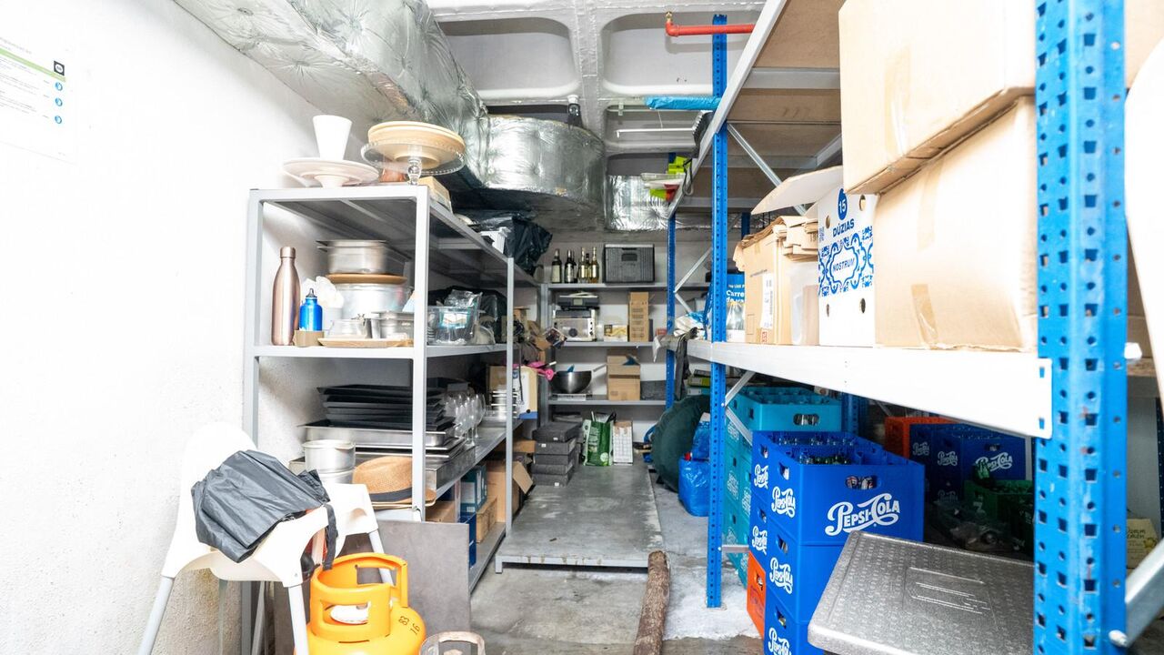 Garage shelving used as a mini-store for supplies
