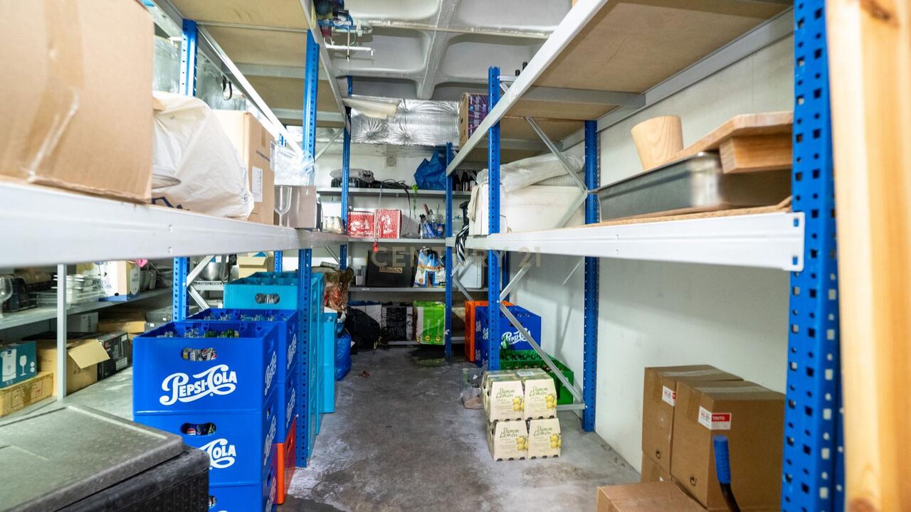 Garage storage with metal shelving and drinks crates
